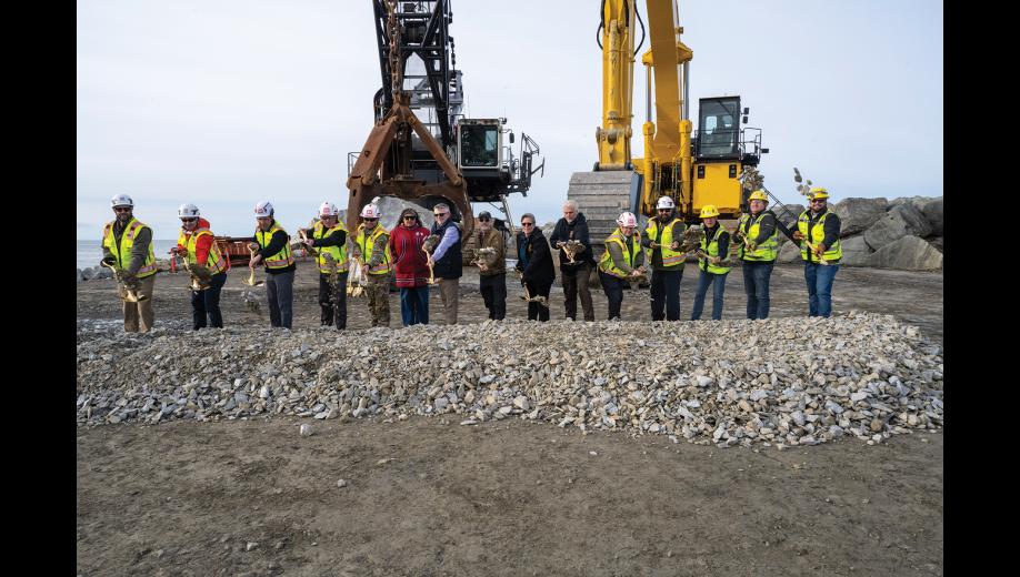 GROUNDBREAKING— Representatives from the U.S. Army Corps of Engineers, city officials and Kiewit representatives celebrate the Nome Port Modification Project’s groundbreaking on Sept. 2 at the end of the causeway at the Port of Nome. Photo by Ariana Crockett O'Harra