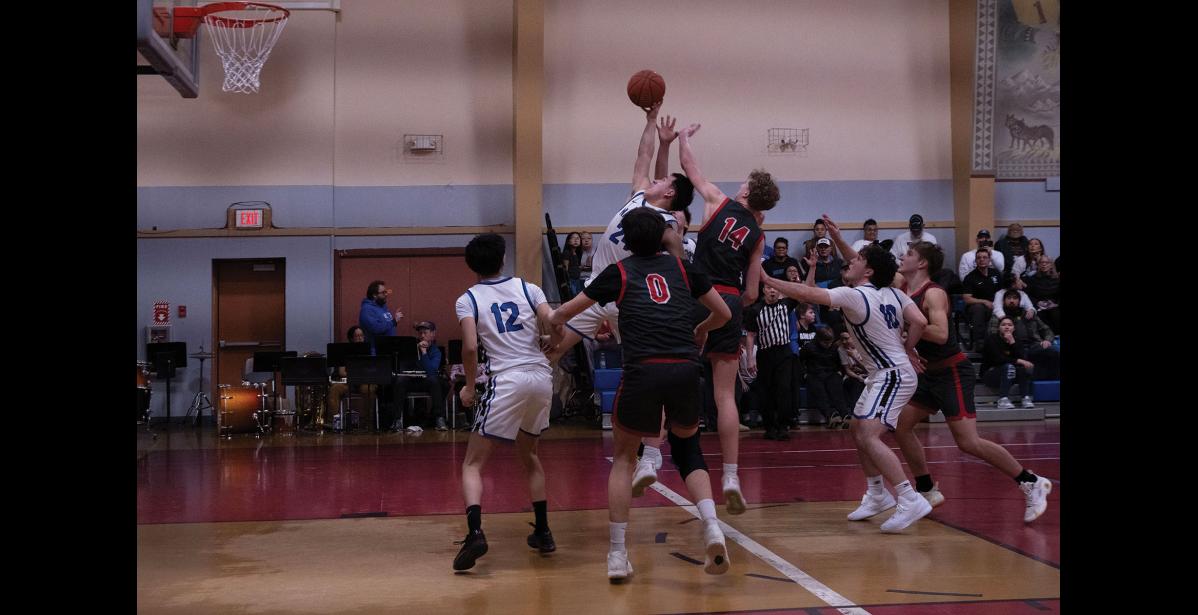 JUMPING – Nome Nanooks and Wasilla Warriors go for the ball during the Ruckus at the Rec on Friday, January 23.