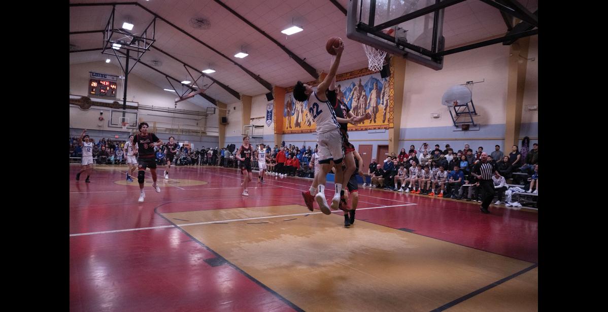 JUMPSHOT – Lane Schuerch jumps for the ball at the Ruckus at the Rec on Friday, January 23.