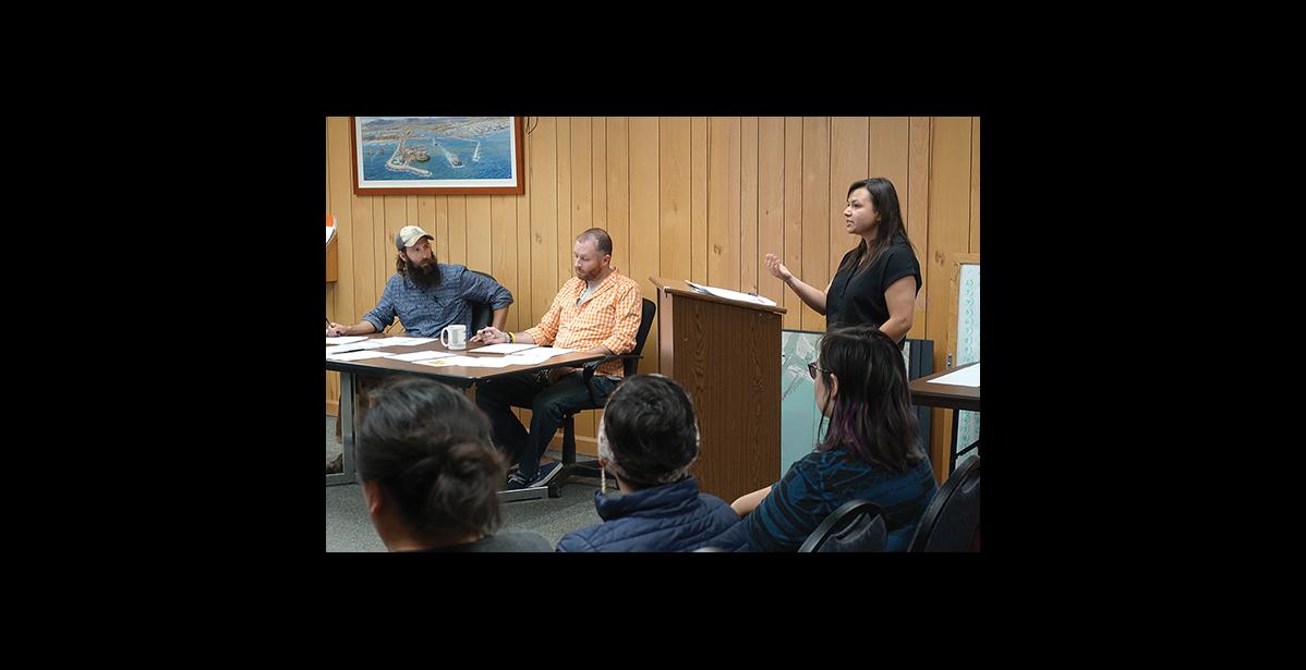 Photo by Nils Hahn Tom Moran, center, at a special meeting regarding Meghan Topkok's appeal of City Clerk's decision she was ineligible to run for City Council.