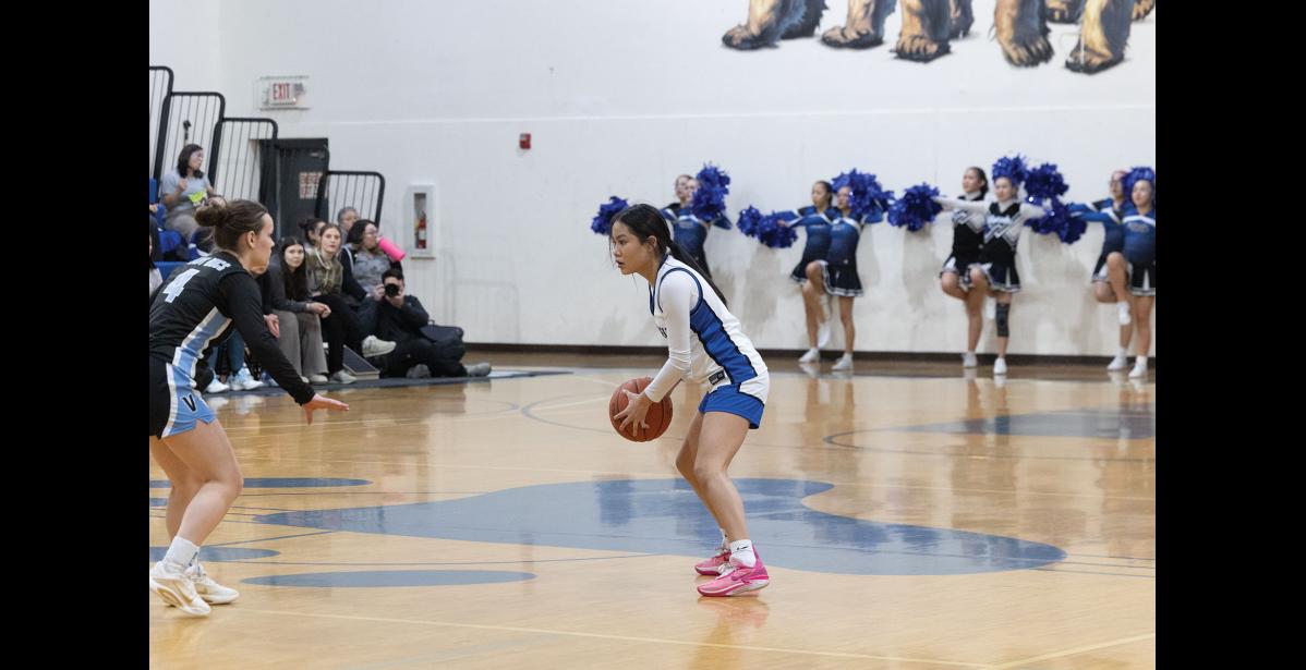 Photo by Ariana Crockett O'Harra FACEOFF – Luella Tumulak faces off against the Valdez Buccaneers during the Lady Nanooks’ game on Saturday, January 10.
