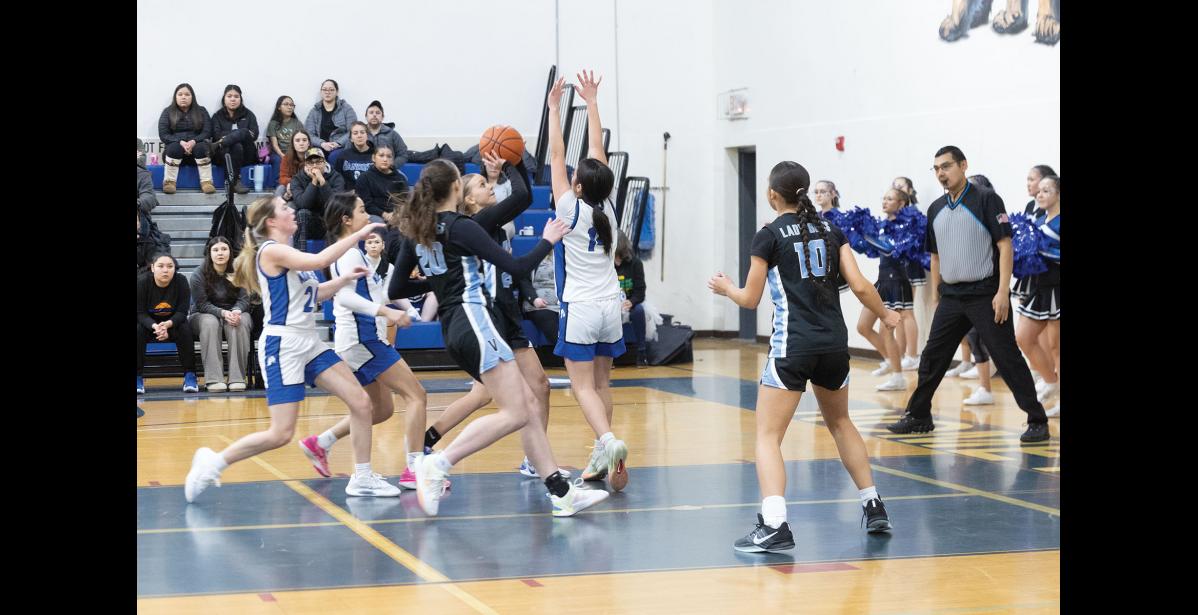 Photo by Ariana Crockett O'Harra BLOCKING – Peyton Lewis tries to block a shot during the Lady Nanooks game against the Valdez Buccaneers at the Subway Showdown in the Nome-Beltz Middle High School Gymnasium on Saturday, January 10.