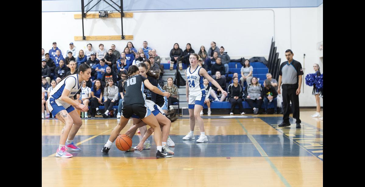 Photo by Ariana Crockett O'Harra BALL DOWN – Sage Gregg grabs for the ball during the Lady Nanooks’ game against the Valdez Buccaneers on Saturday, January 10.