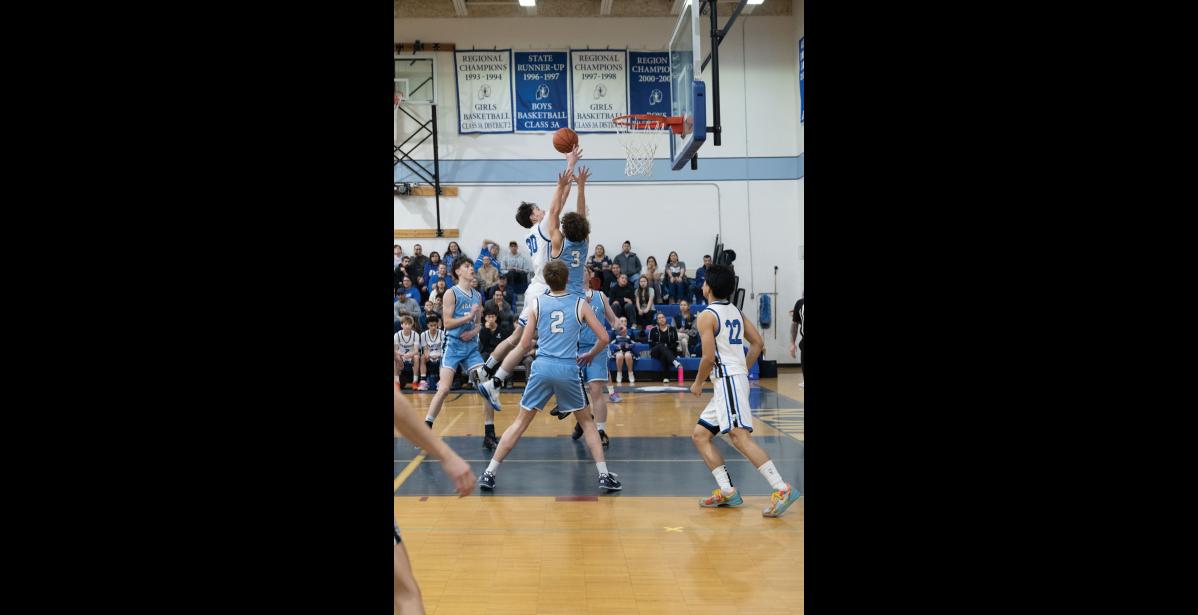 Photo by Ariana Crockett O’Harra POINT – Cohen Booth jumps for the ball during the Nanooks’ game against the Valdez Buccaneers on Saturday, January 10.