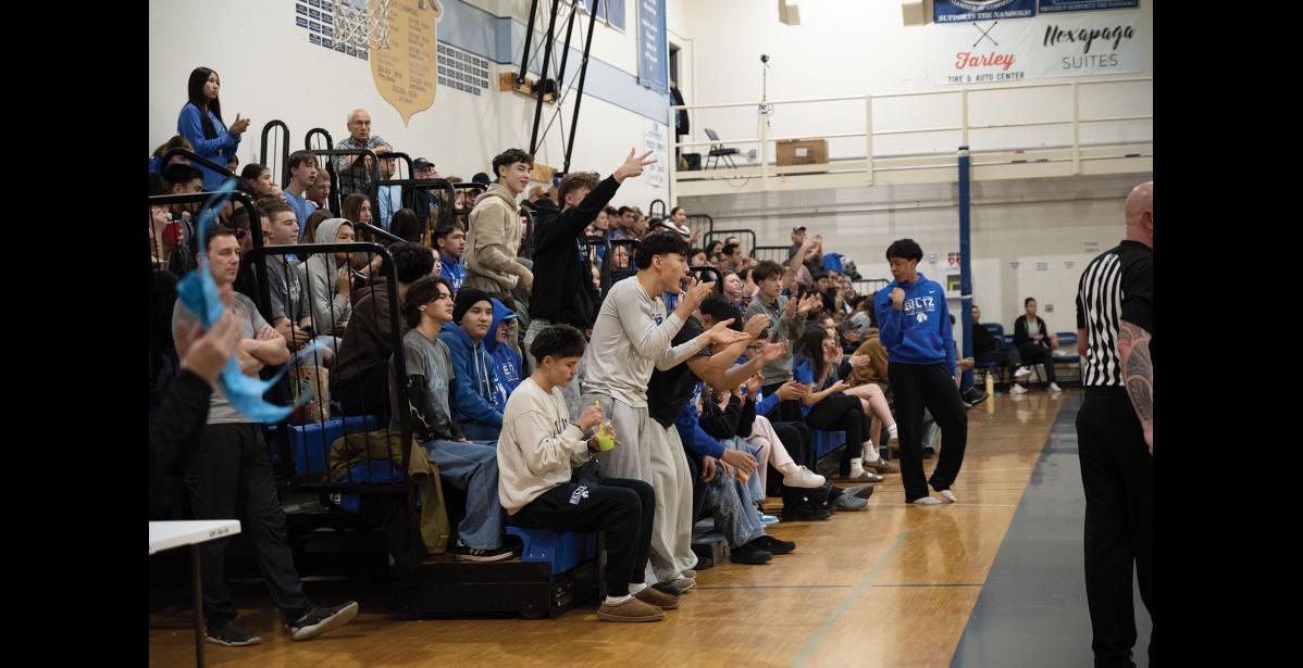 Photo by Ariana Crockett O'Harra STUDENT SECTION – Members of the student section cheer as the Nanooks score a point during their game against the Valdez Buccaneers on Saturday, January 10.