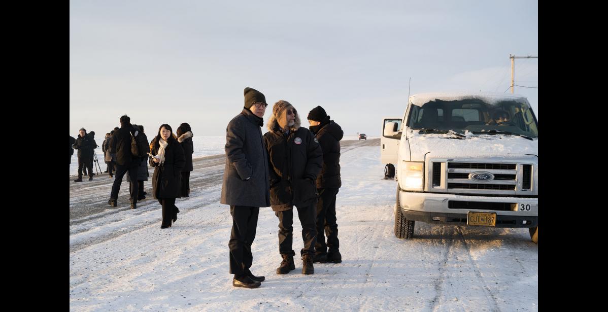 Photo by Ariana Crockett O'Harra COLD AND CLEAR – Nome Mayor Kenny Hughes speaks with Busan Mayor Park Heong-Joon Park at the Swanberg Dredge pullout on Tuesday, January 6.