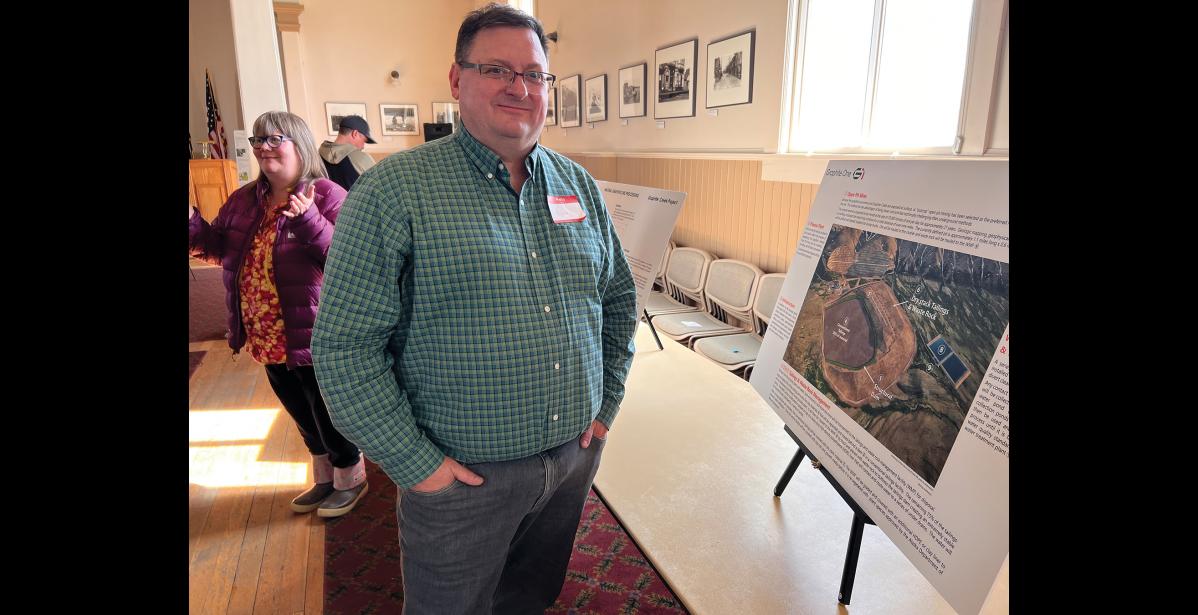 Photo by Diana Haecker OPEN HOUSE— Graphite One Senior Vice President of Mining Kevin Torpy was on hand to answer questions during the G1 open house event in Nome on May 31.