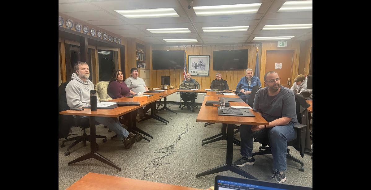 Photo by Diana Haecker LISTENING— Council members (left to right) Scot Henderson, Maggie Miller, Kohren Green, Mayor Ken Hughes, City Manager Lee Smith, council members Mark Johnson and Adam Lust listen to public comment