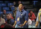 CLIMATE CHANGE RESOLUTION—Esau Sinnok speaks passionately in support of the Youth and Elders climate change resolutions at AFN.