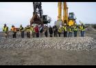 GROUNDBREAKING— Representatives from the U.S. Army Corps of Engineers, city officials and Kiewit representatives celebrate the Nome Port Modification Project’s groundbreaking on Sept. 2 at the end of the causeway at the Port of Nome. Photo by Ariana Crockett O'Harra